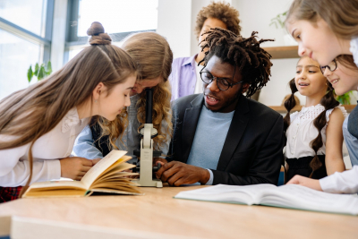 students using a microscope